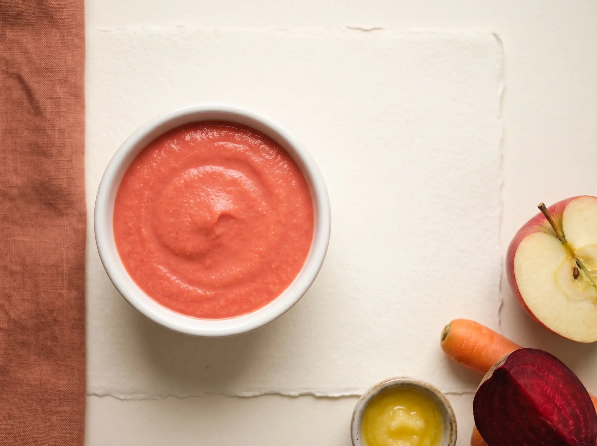 Rainbow apple, carrot & beetroot purée — bright colour that draws a baby to vegetables (6–12 months)