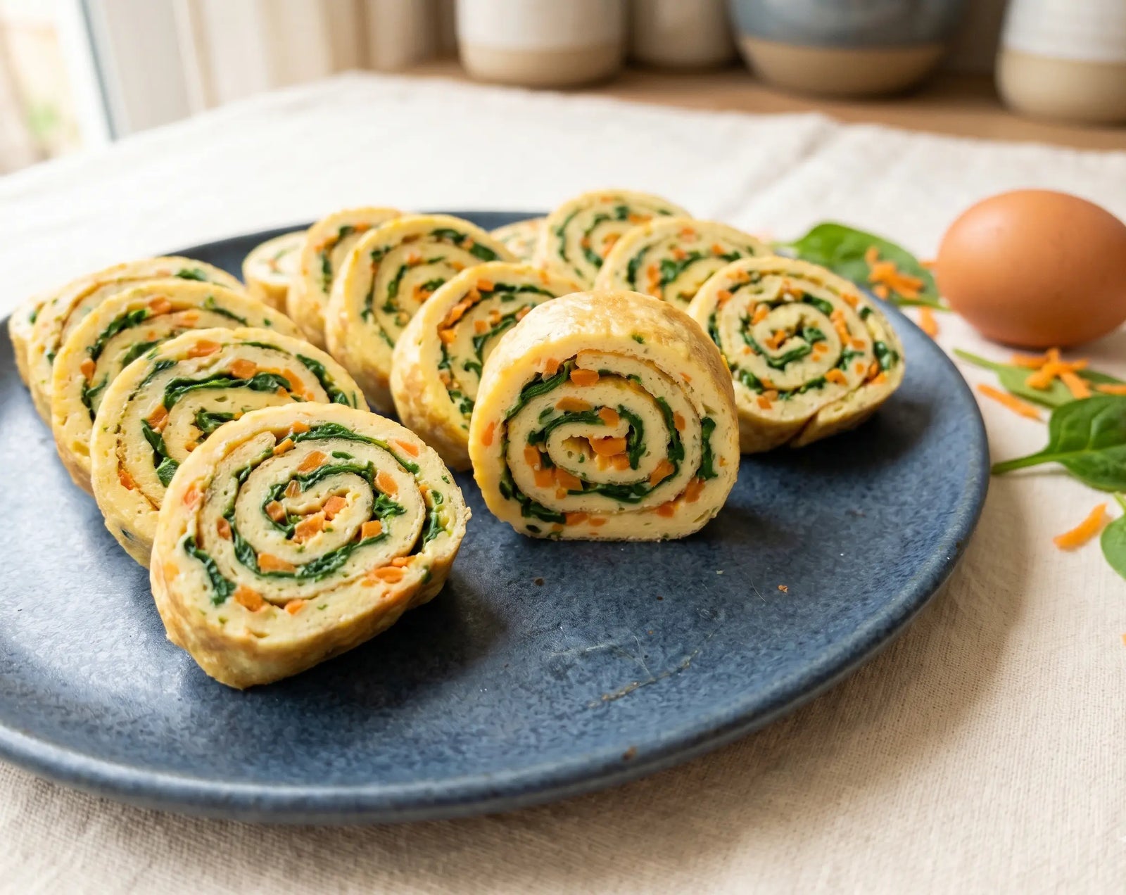 Soft veg omelette roll — protein spirals a picky toddler picks up (1–2 years)